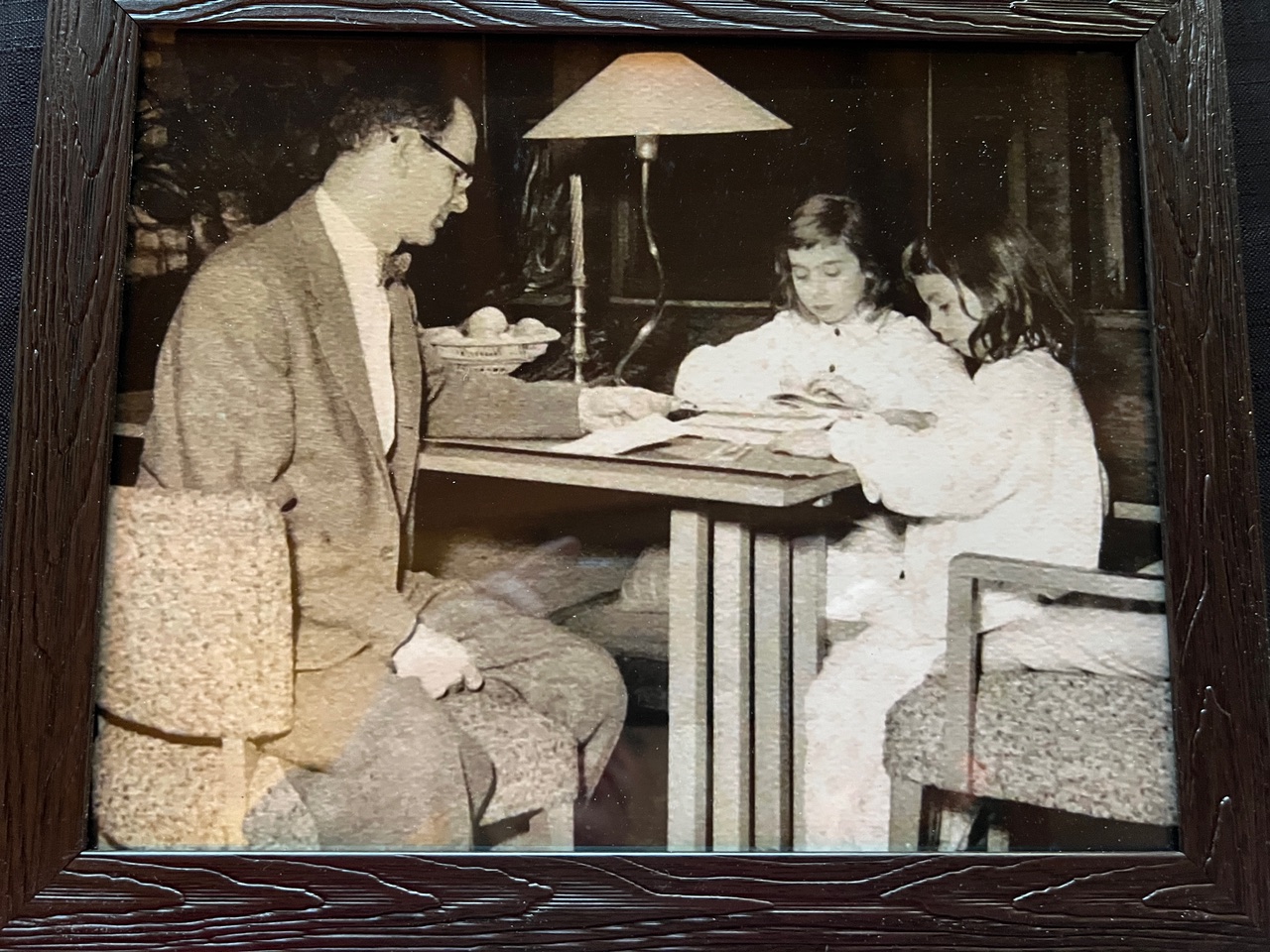 Alex at dining room table, with daughters, Suzanne and Sandie, 1956